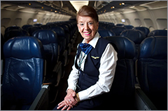 Bette Nash photograph sitting in an airplane cabin